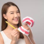 young smiling woman teeth whitening